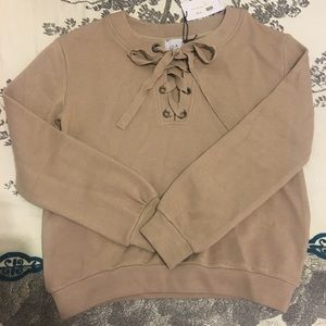 Lace up long sleeve top